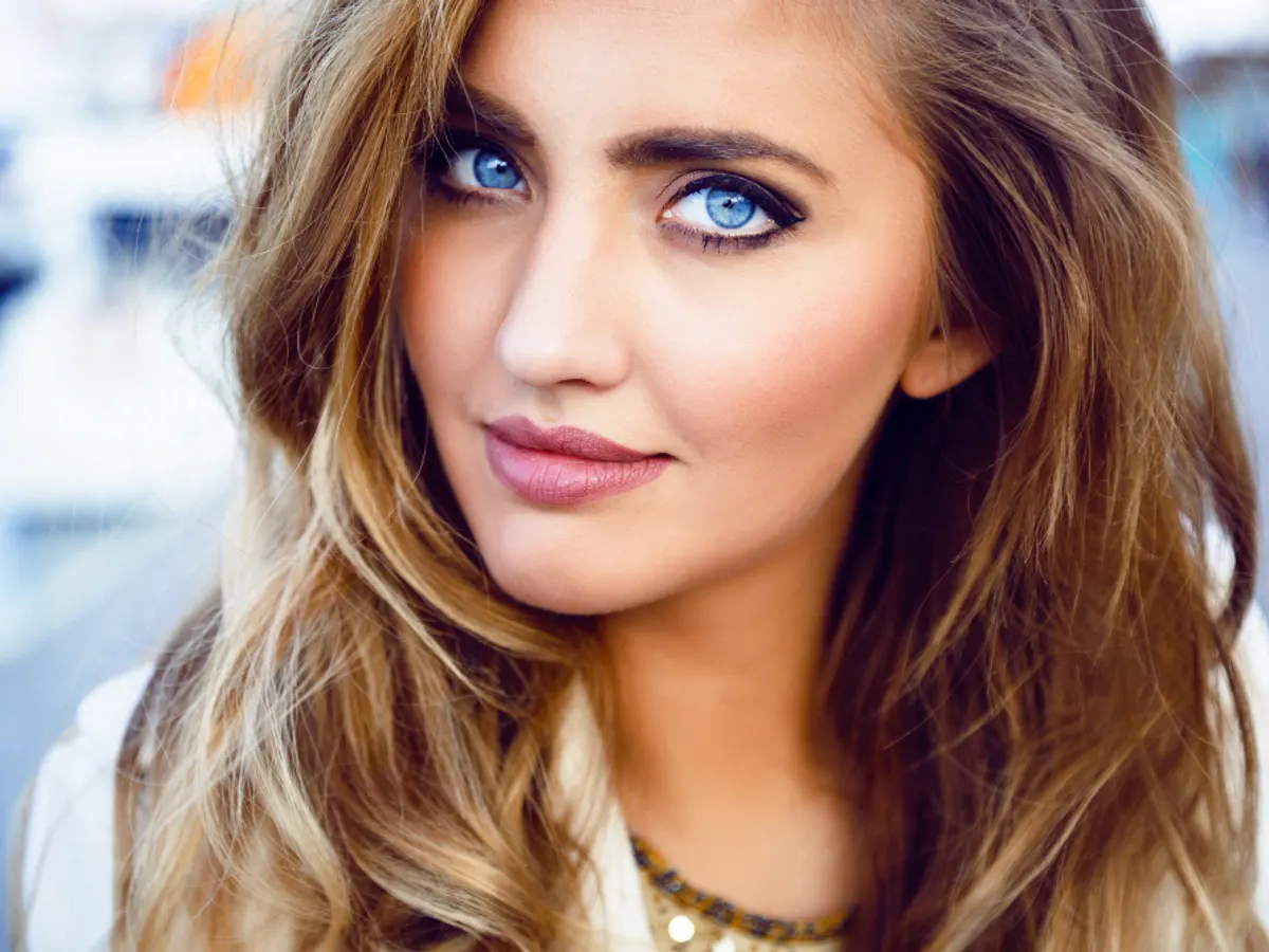 Portrait of a woman with defined lashes